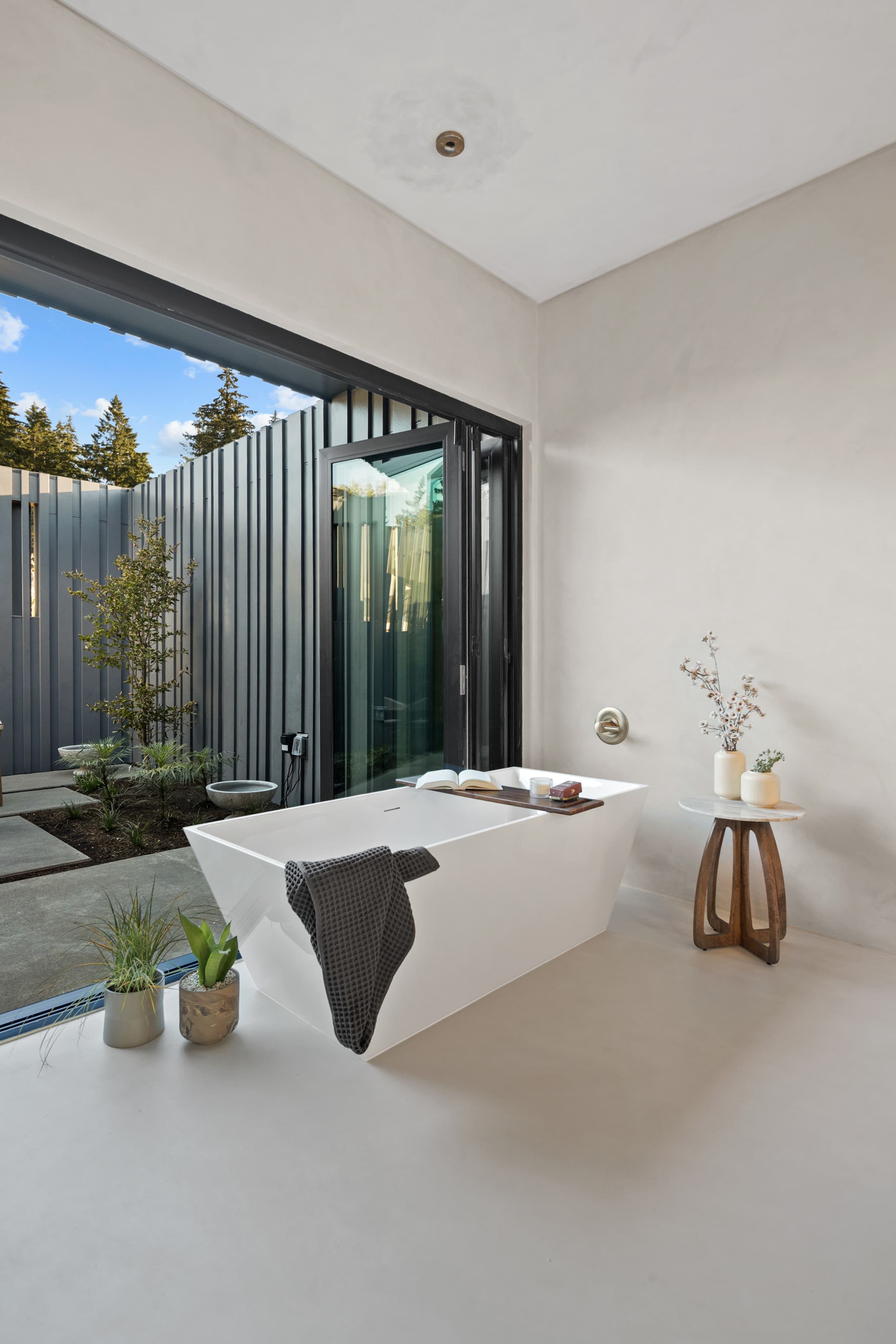 Concretta seamless microcement wet-area finish in the Creekside Homes Street of Dreams home