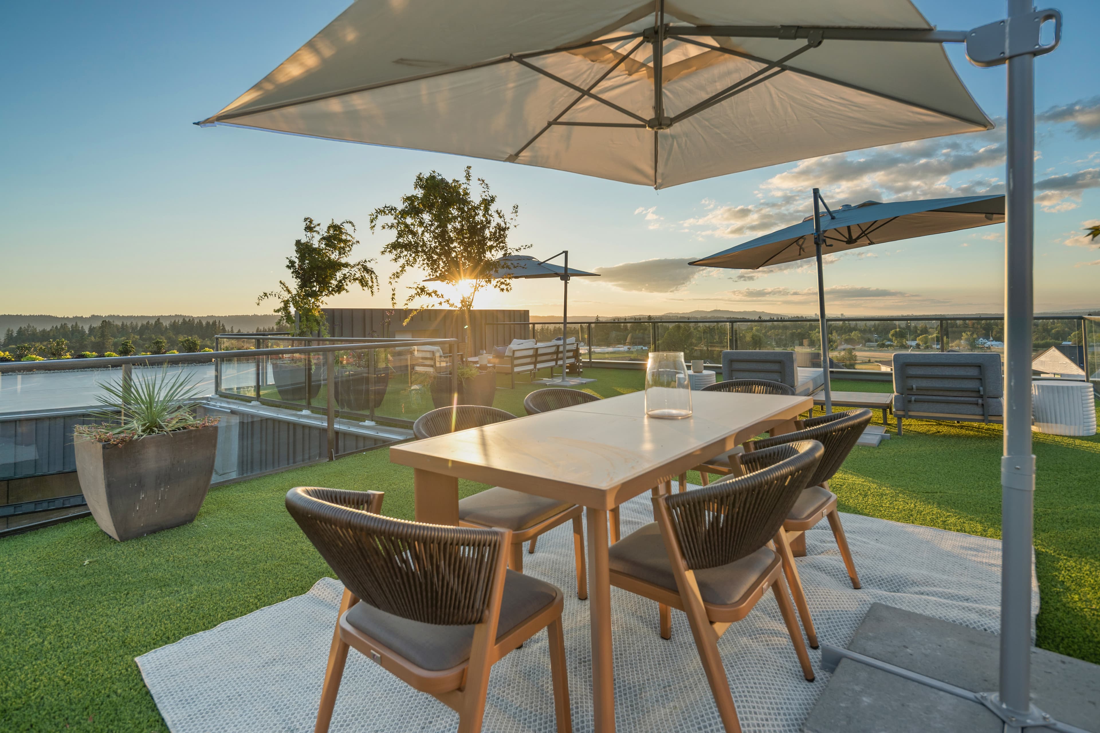 The home's faceted wings following the angled property line, wrapping the central courtyard