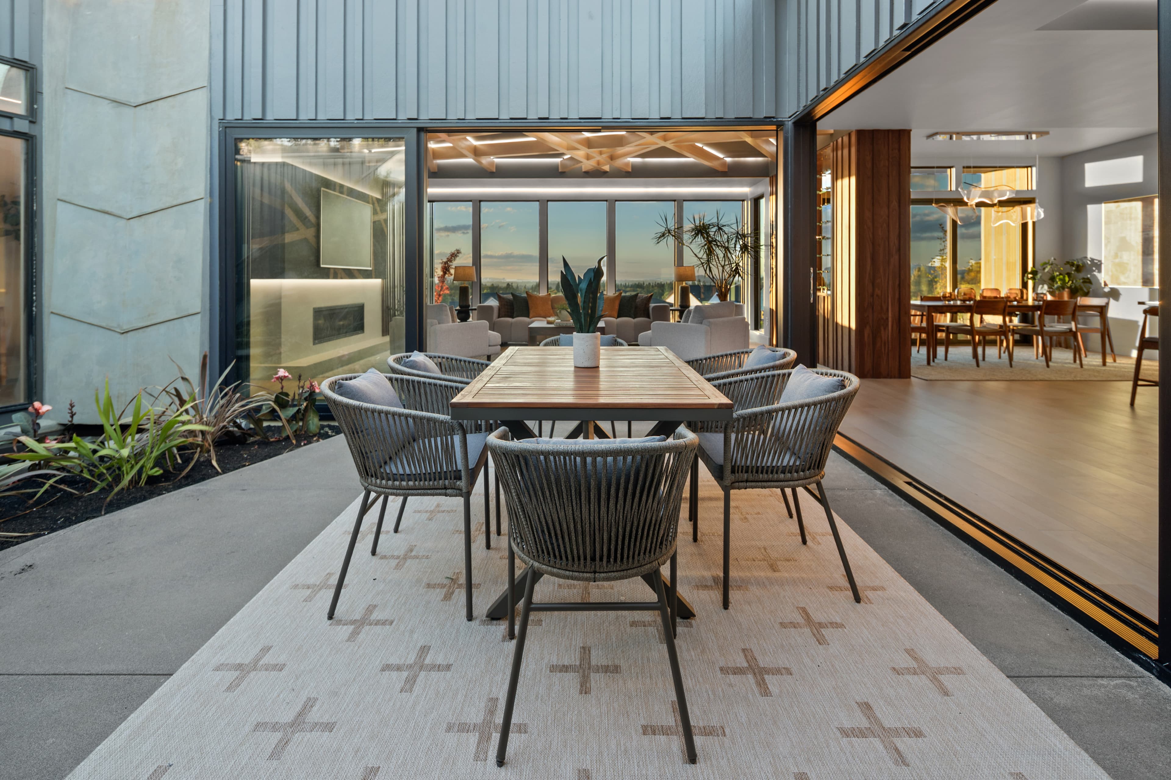 Walls of glass opening the home's living space onto the central open-air courtyard