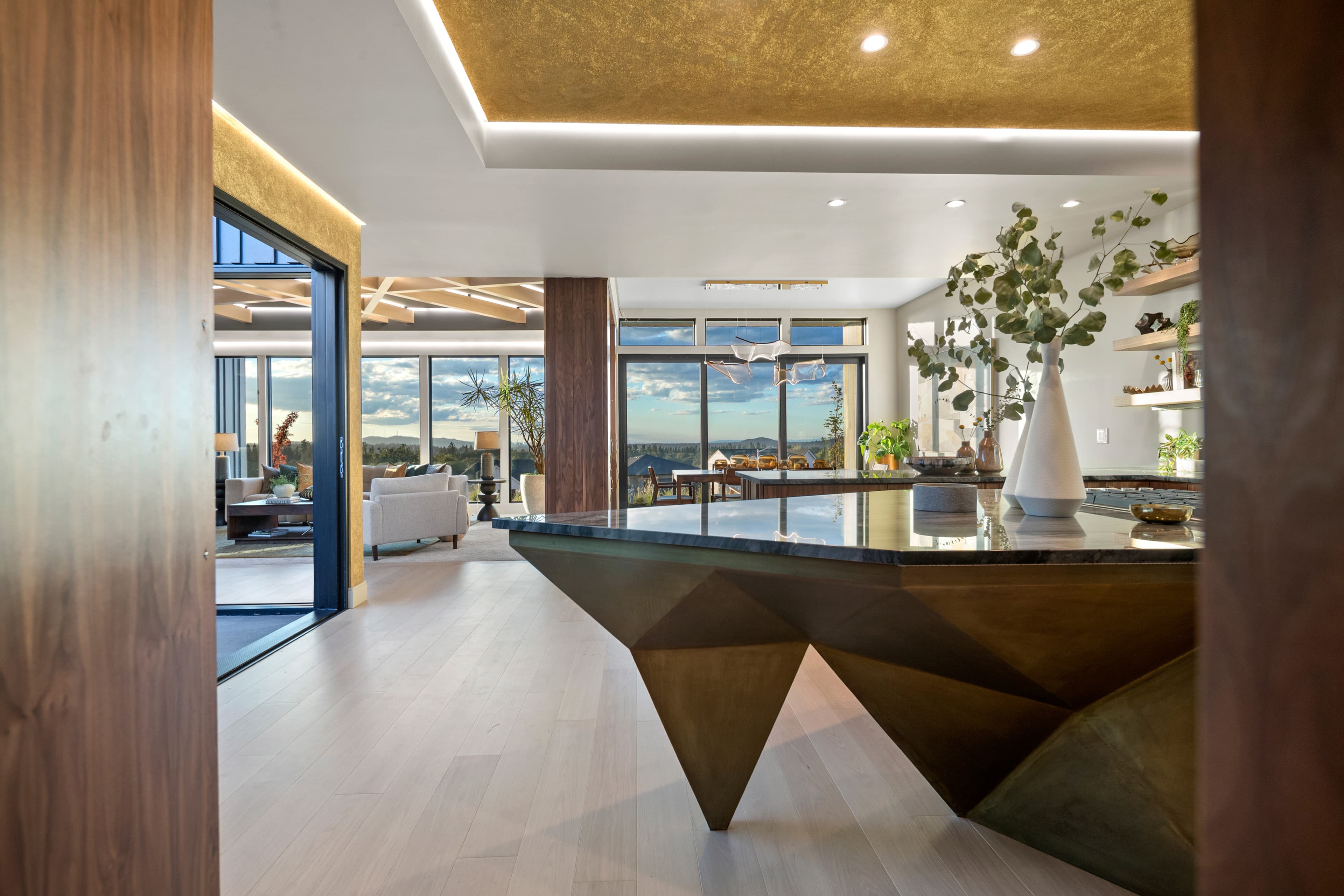 Custom faceted metal kitchen island base in the Creekside Homes Street of Dreams home