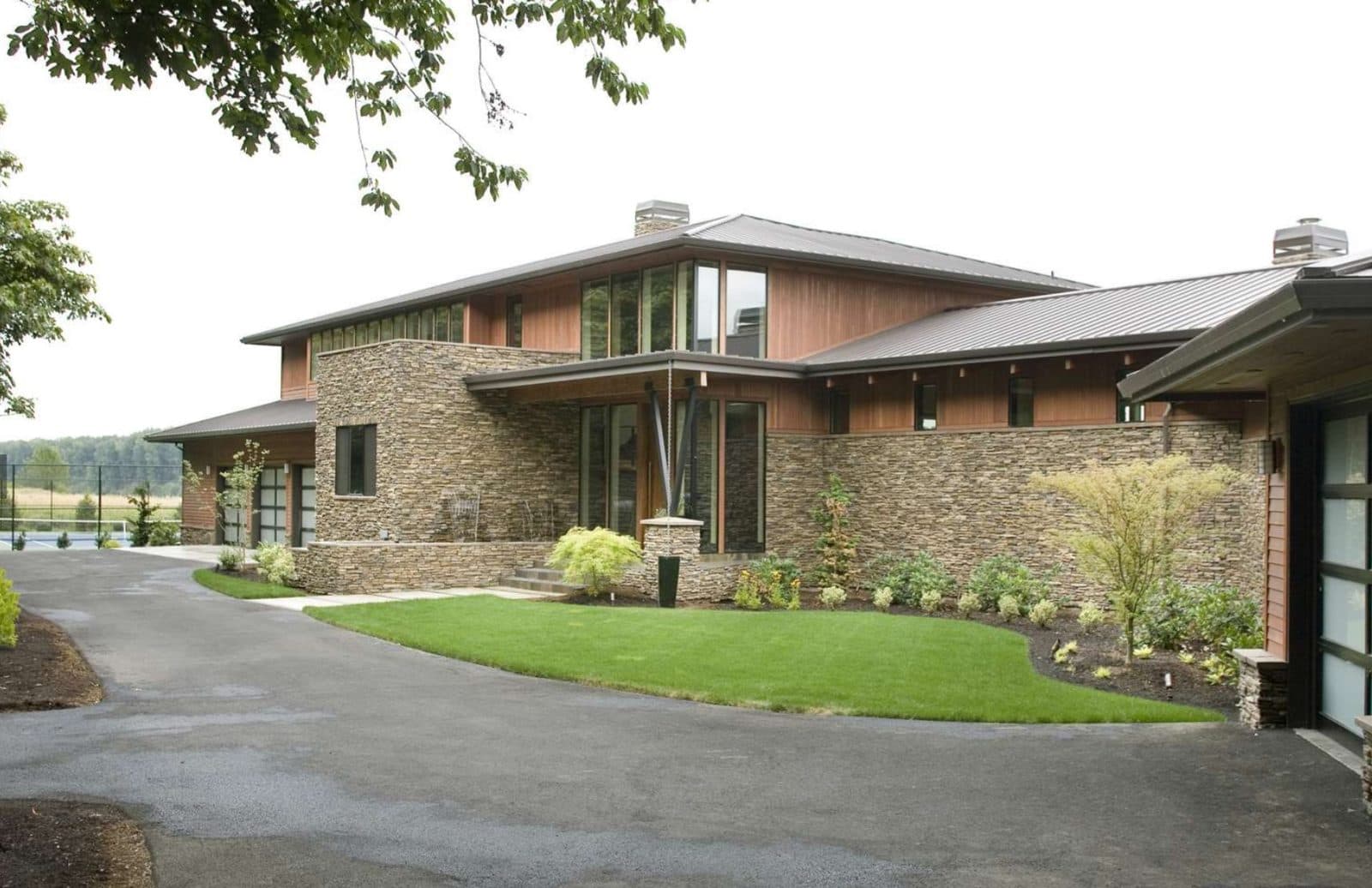 Northwest-modern stone-and-timber custom home by Creekside Homes in Oregon